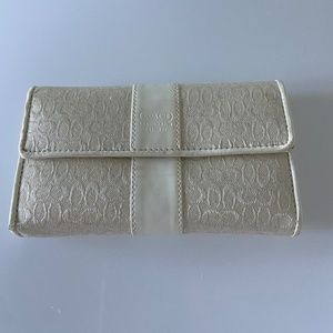 Cream colored Coach wallet